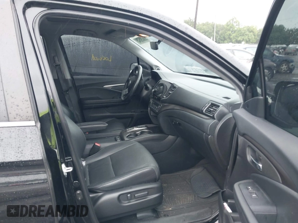 2022 Honda Pilot EX-L with VIN 5FNYF6H58NB018372, listed as a IAAI auction lot 42327580 with 79,332 mi miles and . Bid and sale history available at DreamBid. Image 5.