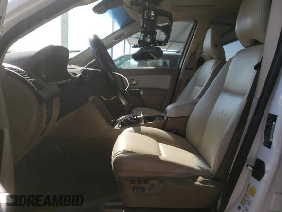 2013 Volvo XC90 Premier Plus с VIN YV4952CZ6D1661270, выставлен на аукционе Copart как лот 50819805 с пробегом 133 375 миль миль и Списание • Salvage title. История ставок и продаж доступна на DreamBid. Изображение 7.