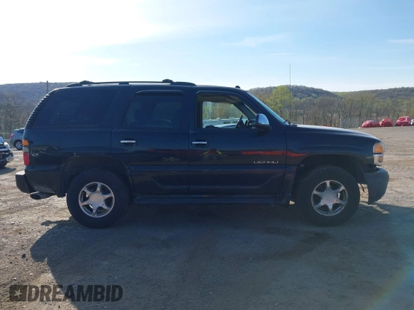 2005 GMC Yukon Denali z VIN 1GKEK63U55J254214, wystawiony jako IAAI lot #42103378 z przebiegiem 131 183 mil mil oraz . Historia ofert i sprzedaży dostępna na DreamBid. Obrazek 12.