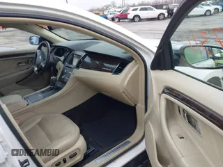 2015 Ford Taurus Limited with VIN 1FAHP2F85FG117635, listed as a IAAI auction lot 41979311 with 104,314 mi miles. Bid and sale history available at carsss.com. Image 5.