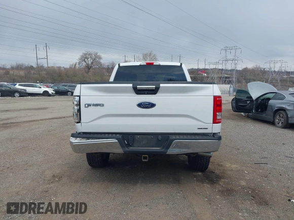 2015 Ford F-150 XLT with VIN 1FTFX1EFXFFC18381, listed as a IAAI auction lot 41886719 with 162,644 mi miles and . Bid and sale history available at DreamBid. Image 17.