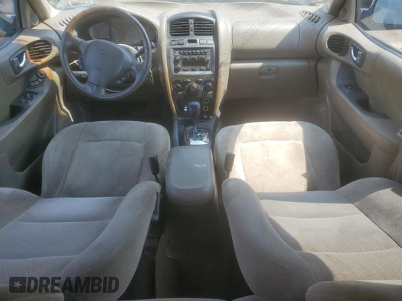 2004 Hyundai Santa Fe GLS with VIN KM8SC13D04U768091, listed as a Copart auction lot 60824345 with 119,571 mi miles and Salvage title. Bid and sale history available at DreamBid. Image 8.