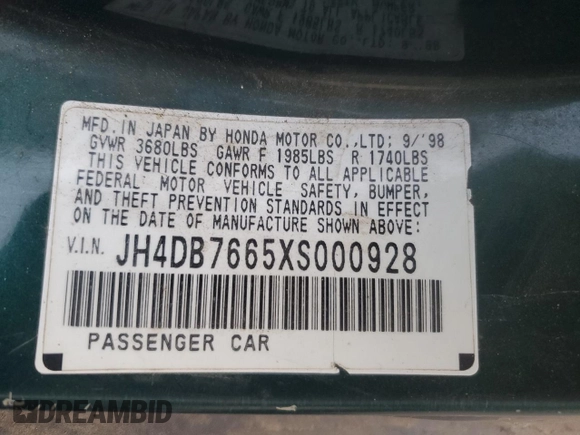 1999 Acura Integra with VIN JH4DB7665XS000928, listed as a Copart auction lot 80924344 with 198,981 mi miles and Salvage title. Bid and sale history available at DreamBid. Image 12.