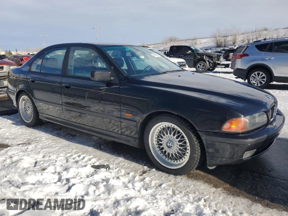 2000 BMW 5 Series 528iA with VIN WBADM6349YGV03856, listed as a Copart auction lot 41798265 with 253,628 mi miles and Salvage Title. Bid and sale history available at carsss.com. Image 4.