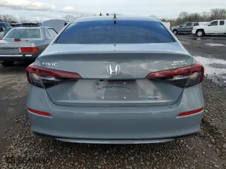 2025 Honda Civic Sedan Hybrid Sport with VIN 2HGFE4F83SH304505, listed as a Copart auction lot 45272215 with 2,830 mi miles and Salvage Title. Bid and sale history available at carsss.com. Image 6.