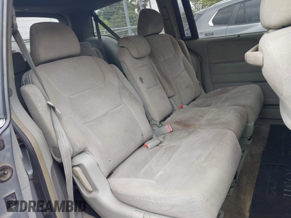 2005 Honda Odyssey EX with VIN 5FNRL38415B104920, listed as a IAAI auction lot 42094690 with 228,538 mi miles. Bid and sale history available at carsss.com. Image 8.