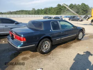 1996 Mercury Cougar z VIN 1MELM62W6TH629420, wystawiony jako Copart lot #67101634 z przebiegiem 71 996 mil mil oraz Szkody całkowita. Historia ofert i sprzedaży dostępna na DreamBid. Obrazek 3.