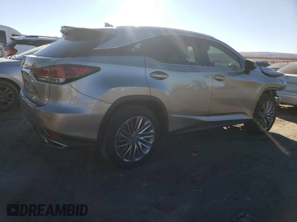 2022 Lexus RX with VIN 2T2JZMAA7NC257707, listed as a Copart auction lot 83791524 with 31,965 mi miles and Salvage Title. Bid and sale history available at carsss.com. Image 3.