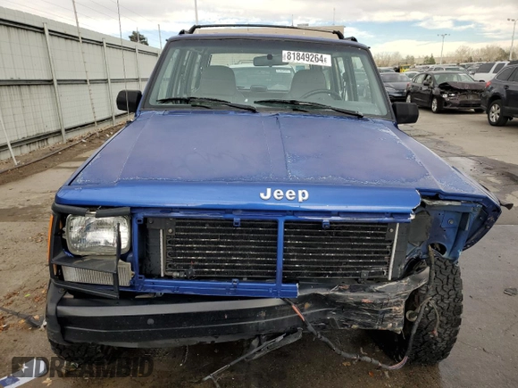 1995 Jeep Cherokee SE with VIN 1J4FJ28S9SL667332, listed as a Copart auction lot 81849264 with 201,205 mi miles and Salvage Title. Bid and sale history available at carsss.com. Image 5.