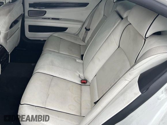 2013 BMW 7 Series 750Li xDrive with VIN WBAYF8C5XDD139832, listed as a IAAI auction lot 42487869 with 149,480 mi miles and . Bid and sale history available at DreamBid. Image 8.