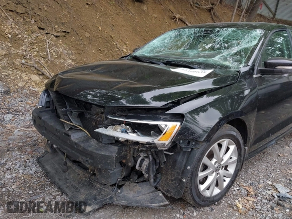 2014 Volkswagen Jetta SE z VIN 3VWD17AJ2EM273523, wystawiony jako IAAI lot #42360638 z przebiegiem 124 583 mil mil oraz . Historia ofert i sprzedaży dostępna na DreamBid. Obrazek 6.