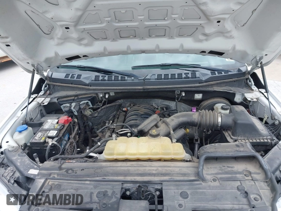 2019 Ford F-150 XL z VIN 1FTMF1C51KKC79270, wystawiony jako IAAI lot #42337543 z przebiegiem 146 916 mil mil oraz . Historia ofert i sprzedaży dostępna na DreamBid. Obrazek 10.