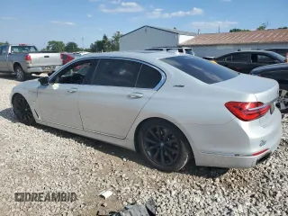2017 BMW 7 Series 740e xDrive iPerformance with VIN WBA7J2C3XHG497958, listed as a Copart auction lot 58203604 with 75,256 mi miles and Salvage Title. Bid and sale history available at carsss.com. Image 2.