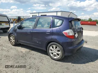 2009 Honda Fit Sport z VIN JHMGE88679S004599, wystawiony jako Copart lot #55719325 z przebiegiem 201 093 mil mil oraz Czysty tytuł • Clean title. Historia ofert i sprzedaży dostępna na DreamBid. Obrazek 2.