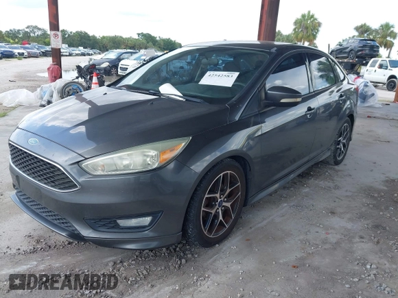 2015 Ford Focus SE with VIN 1FADP3F23FL247162, listed as a IAAI auction lot 42542583 with 95,852 mi miles and . Bid and sale history available at DreamBid. Image 2.
