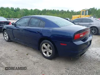 2013 Dodge Charger SE z VIN 2C3CDXBG7DH580034, wystawiony jako IAAI lot #42209139 z przebiegiem 185 906 mil mil oraz . Historia ofert i sprzedaży dostępna na DreamBid. Obrazek 3.