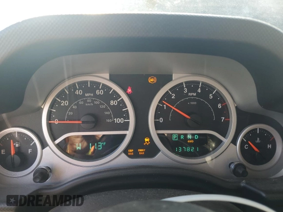 2010 Jeep Wrangler Rubicon with VIN 1J4BA6D10AL109001, listed as a Copart auction lot 69453954 with 137,821 mi miles and Salvage title. Bid and sale history available at DreamBid. Image 9.