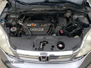 2007 Honda CR-V EX z VIN JHLRE48557C075398, wystawiony jako Copart lot #57833385 z przebiegiem 202 803 mil mil oraz Czysty tytuł • Clean title. Historia ofert i sprzedaży dostępna na DreamBid. Obrazek 12.