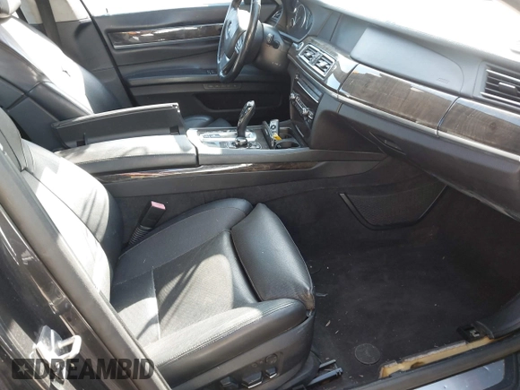 2012 BMW 7 Series 750Li xDrive with VIN WBAKC8C55CC436123, listed as a IAAI auction lot 41779443 with 126,618 mi miles and . Bid and sale history available at DreamBid. Image 5.