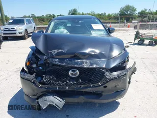 2021 Mazda CX-30 S with VIN 3MVDMAAL7MM268341, listed as a IAAI auction lot 42051154 with 19,539 mi miles and . Bid and sale history available at carsss.com. Image 12.