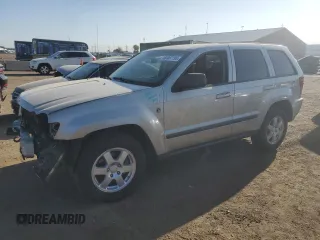 2008 Jeep Grand Cherokee Laredo with VIN 1J8HR48N38C212538, listed as a Copart auction lot 60467195 with 165,180 mi miles and Salvage title. Bid and sale history available at DreamBid. Image 1.