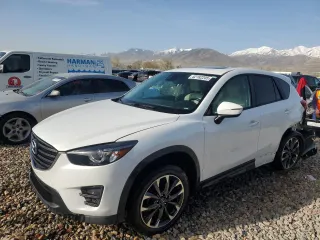 2016 Mazda CX-5 Grand Touring with VIN JM3KE4DY3G0688286, listed as a Copart auction lot 52182205 with 194,352 mi miles and Salvage Title. Bid and sale history available at DreamBid. Image 1.
