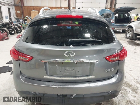 2017 Infiniti QX70 z VIN JN8CS1MU3HM143799, wystawiony jako IAAI lot #41554527 z przebiegiem 70 453 mil mil oraz . Historia ofert i sprzedaży dostępna na DreamBid. Obrazek 16.
