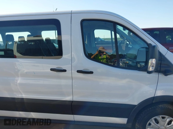 2023 Ford Transit Passenger XL with VIN 1FBAX2Y8XPKB41098, listed as a IAAI auction lot 42218691 with 28,891 mi miles and . Bid and sale history available at DreamBid. Image 13.