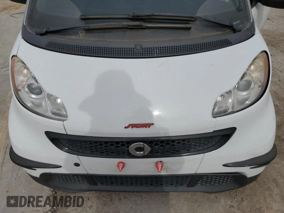 2013 Smart fortwo Pure с VIN WMEEJ3BA9DK618746, выставлен на аукционе Copart как лот 56752885 с пробегом 80 293 миль миль и Списание • Salvage title. История ставок и продаж доступна на DreamBid. Изображение 11.