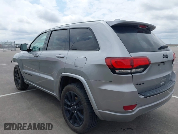 2017 Jeep Grand Cherokee Laredo with VIN 1C4RJFAG1HC701921, listed as a IAAI auction lot 42164963 with 135,039 mi miles and . Bid and sale history available at DreamBid. Image 3.