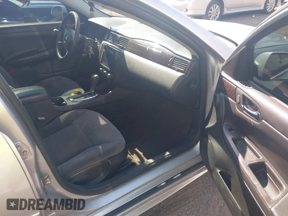 2015 Chevrolet Impala LS with VIN 2G1WA5E33F1138127, listed as a IAAI auction lot 42499132 with 111,771 mi miles and . Bid and sale history available at DreamBid. Image 5.