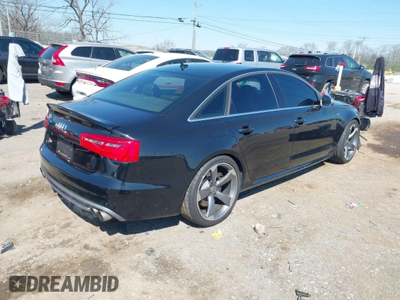 2013 Audi S6 Prestige with VIN WAUJ2AFC0DN096028, listed as a IAAI auction lot 41817347 with 132,992 mi miles. Bid and sale history available at carsss.com. Image 4.