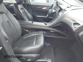 2014 Lincoln MKZ with VIN 3LN6L2G90ER832698, listed as a IAAI auction lot 41887879 with 141,798 mi miles and . Bid and sale history available at DreamBid. Image 5.