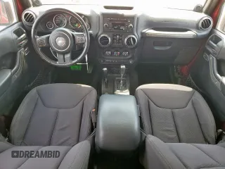 2013 Jeep Wrangler Unlimited Sport z VIN 1C4BJWDGXDL606491, wystawiony jako Copart lot #56065425 z przebiegiem 168 709 mil mil oraz Szkoda całkowita • Salvage title. Historia ofert i sprzedaży dostępna na DreamBid. Obrazek 8.