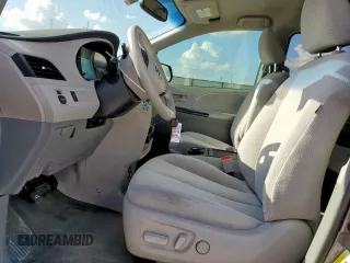 2014 Toyota Sienna LE AAS with VIN 5TDKK3DC8ES445454, listed as a Copart auction lot 62014095 with 143,601 mi miles and Salvage title. Bid and sale history available at DreamBid. Image 7.