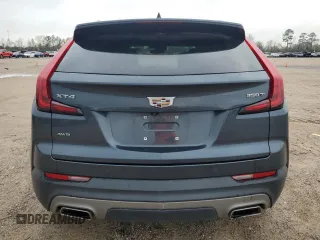 2021 Cadillac XT4 AWD Premium Luxury with VIN 1GYFZDR45MF004541, listed as a Copart auction lot 86712954 with 70,990 mi miles and Salvage Title. Bid and sale history available at carsss.com. Image 6.