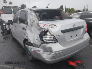 2010 Nissan Versa 1.6 with VIN 3N1CC1AP8AL393730, listed as a IAAI auction lot 41769285 with 204,981 mi miles. Bid and sale history available at carsss.com. Image 6.