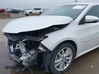 2014 Toyota Avalon Limited z VIN 4T1BK1EB6EU098479, wystawiony jako IAAI lot #42171736 z przebiegiem 92 290 mil mil oraz . Historia ofert i sprzedaży dostępna na DreamBid. Obrazek 6.
