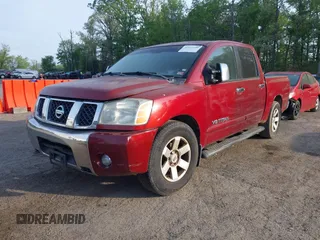 2007 Nissan Titan XE with VIN 1N6BA07A87N231789, listed as a IAAI auction lot 42111290 with 272,425 mi miles. Bid and sale history available at carsss.com. Image 2.