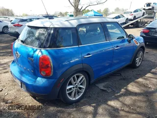 2014 MINI Countryman with VIN WMWZB3C59EWR37439, listed as a IAAI auction lot 42110149 with 181,661 mi miles and . Bid and sale history available at DreamBid. Image 4.