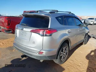 2017 Toyota RAV4 LE with VIN 2T3BFREV2HW672794, listed as a IAAI auction lot 41814820 with 115,721 mi miles and . Bid and sale history available at DreamBid. Image 4.