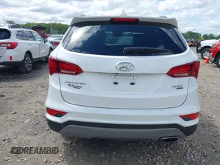 2018 Hyundai Santa Fe 2.4L z VIN 5NMZUDLB1JH101842, wystawiony jako IAAI lot #42302237 z przebiegiem 97 376 mil mil oraz . Historia ofert i sprzedaży dostępna na DreamBid. Obrazek 17.