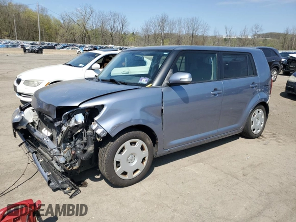 2012 Scion xB with VIN JTLZE4FE7CJ030408, listed as a Copart auction lot 54153195 with 198,649 mi miles and Salvage Title. Bid and sale history available at DreamBid. Image 1.