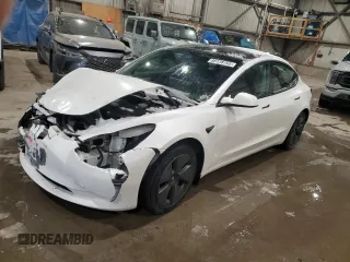 2021 Tesla Model 3 Standard Range Plus z VIN 5YJ3E1EA4MF988784, wystawiony jako Copart lot #88138765 z przebiegiem 62 438 mil mil oraz Szkody całkowita. Historia ofert i sprzedaży dostępna na DreamBid. Obrazek 1.