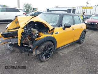 2015 MINI Hardtop 4 Door z VIN WMWXS5C54FT833253, wystawiony jako IAAI lot #42247647 z przebiegiem Nie podano mil oraz . Historia ofert i sprzedaży dostępna na DreamBid. Obrazek 2.