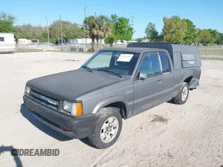 1992 Mazda B-Series Truck with VIN JM2UF3136N0270881, listed as a IAAI auction lot 41814384 with 202,785 mi miles and . Bid and sale history available at DreamBid. Image 2.