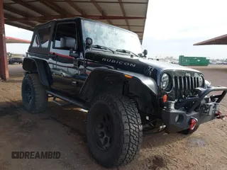 2011 Jeep Wrangler Rubicon with VIN 1J4BA6D13BL545343, listed as a IAAI auction lot 40980056 with 107,207 mi miles. Bid and sale history available at carsss.com. Image 1.