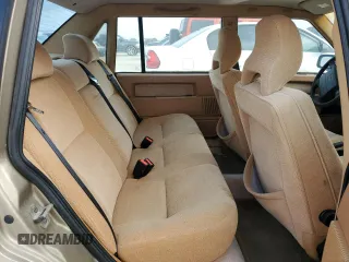 1995 Volvo 900 z VIN YV1JS8318S1193362, wystawiony jako Copart lot #79421424 z przebiegiem 38 881 mil mil oraz Tytuł czysty. Historia ofert i sprzedaży dostępna na DreamBid. Obrazek 10.