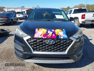 2019 Hyundai Tucson Sport with VIN KM8J33AL5KU902933, listed as a IAAI auction lot 41286316 with 73,799 mi miles. Bid and sale history available at carsss.com. Image 13.