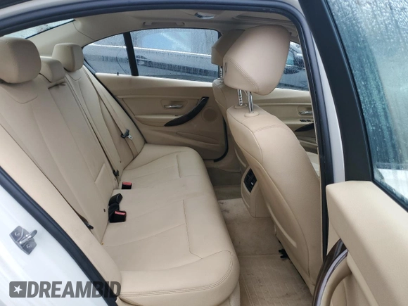 2014 BMW 3 Series 320i xDrive with VIN WBA3C3C51EF983592, listed as a Copart auction lot 60608765 with 195,061 mi miles and Salvage title. Bid and sale history available at DreamBid. Image 10.